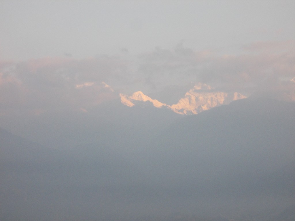 Peak view of Kanchenjunga from distant Peling